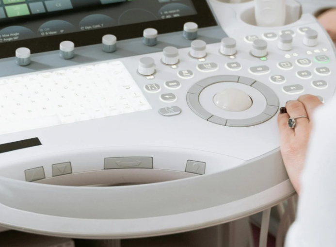 Detailed view of an ultrasound machine's control panel